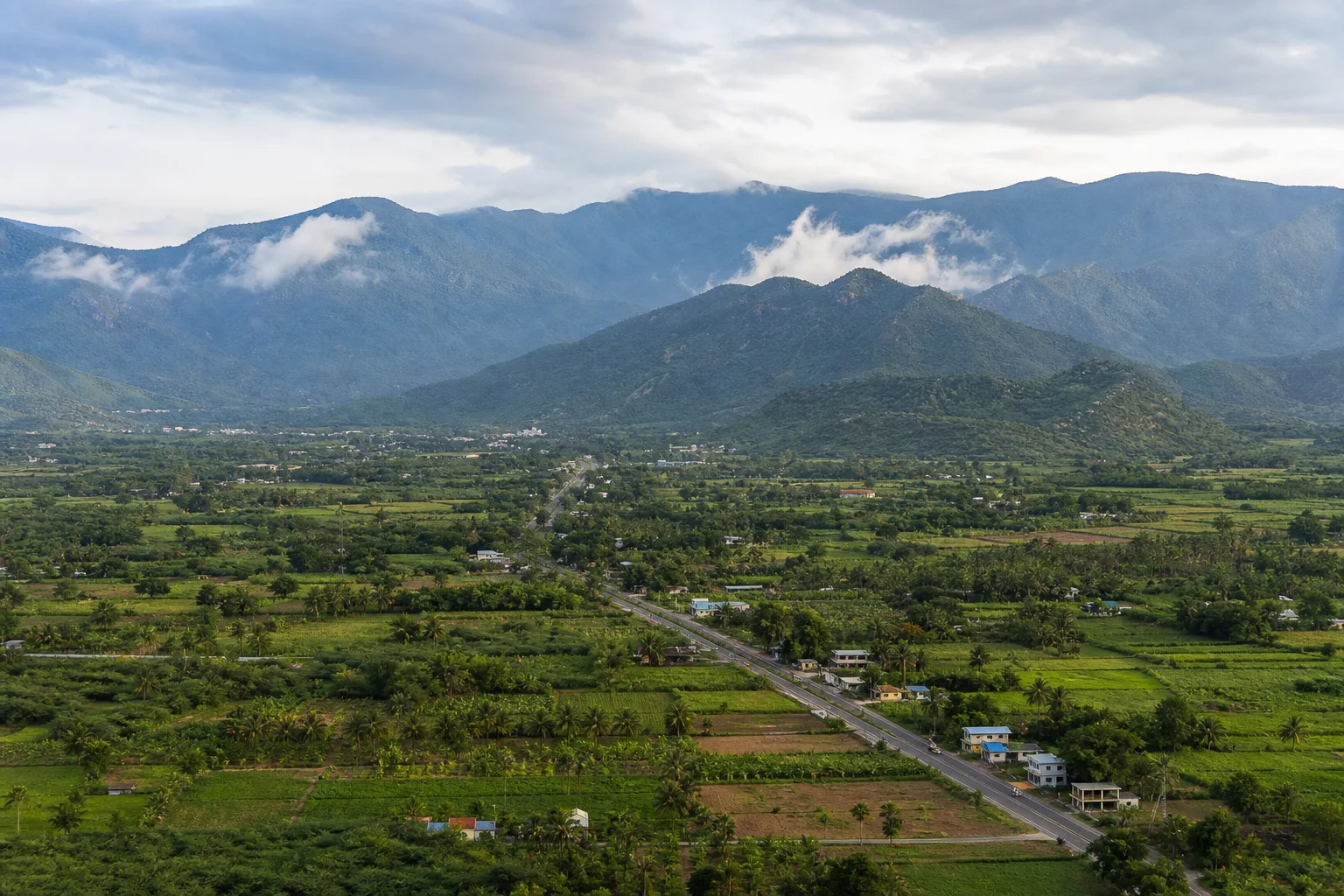 Project-created view across Theni's cultivated valley to the Western Ghats