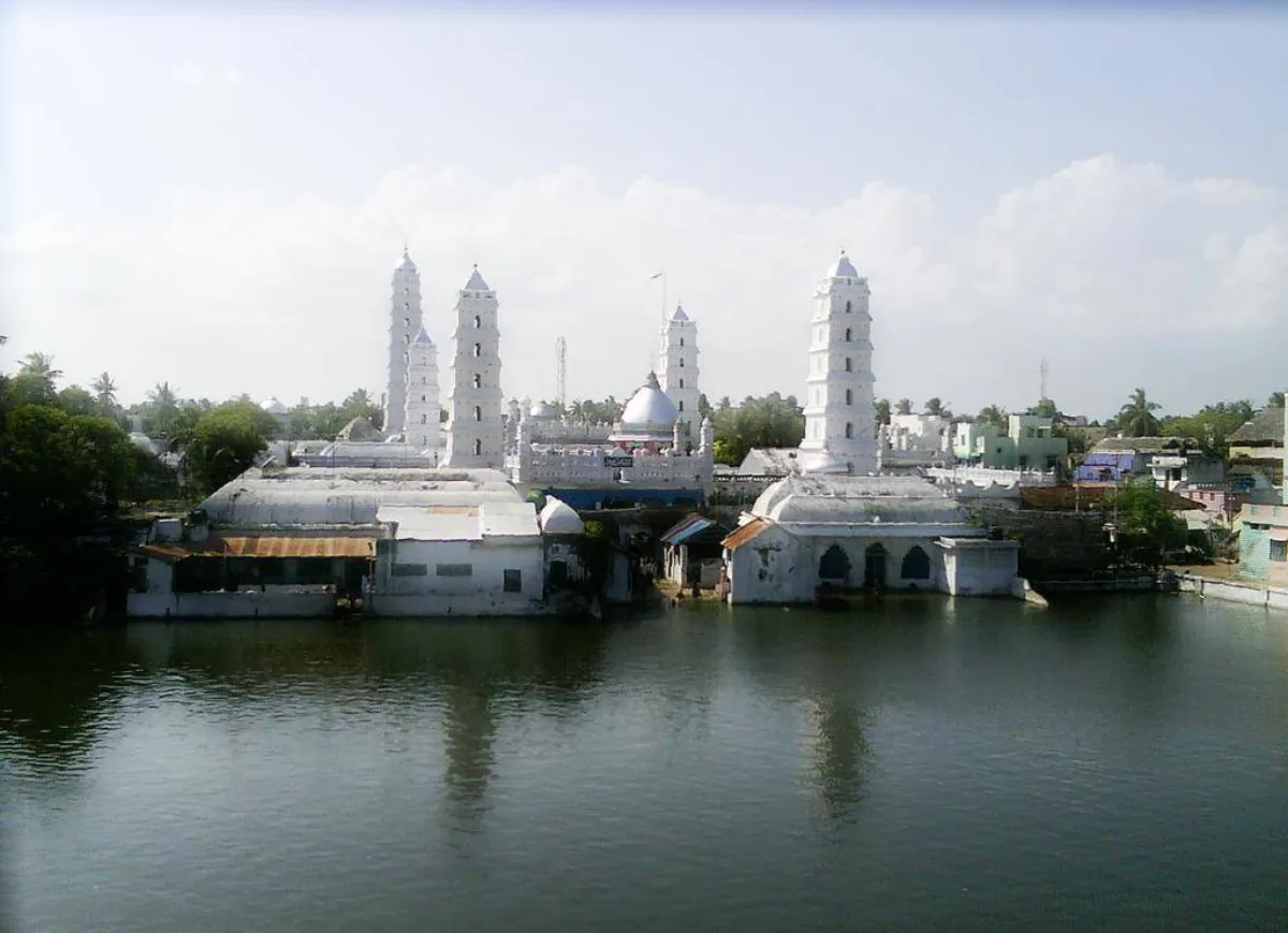 Nagore Dargah and its minarets reflected in the sacred tank