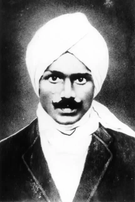 Historical portrait photograph of Tamil poet and journalist Subramania Bharati